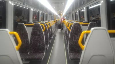 How to go with the Airtrain Brisbane from airport to city center? : Inside the Airtrain Brisbane