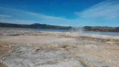 A walk on the Rotorua lake walkway : Steam coming from the ground