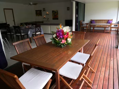 Carlton Plage Tahiti accomodation : Tables and sofa on the terrace