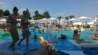 Limits of credit cards international travel insurance : Beach club day in Odessa, Ukraine