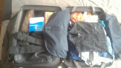 How Packing Like A Minimalist Will Change Your Travels For The Rest Of Your Life : Luggage packed like a minimalist ready for a world tour travel