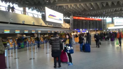 Where To Store Luggage When Traveling : Busy airport in Frankfurt with luggage