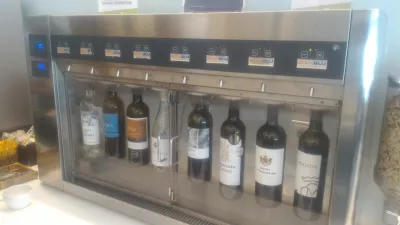 StarAlliance Lisbon airport TAP Portugal airline premium lounge : Wine dispenser machine and wine selection