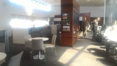 How is Newark airport business club lounge? : Seating area and flights information screens