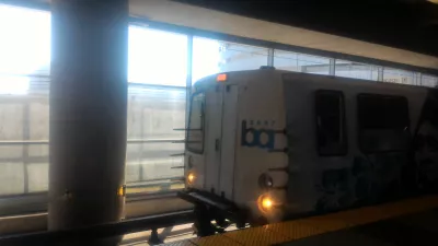 How is the San Francisco public transportation system? : BART train arriving in airport station