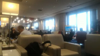 Schengen zone Aegean lounge Athens airport review : Seating area as seen from a lounge sofa