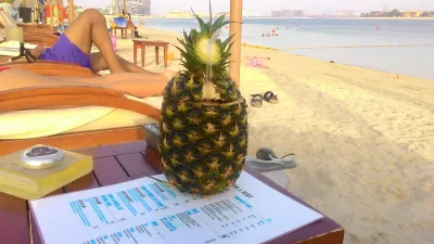 Minne mennä lomalle tänä vuonna? : Pineapple cocktail served in a full real pineapple at Sofitel Palm Dubai