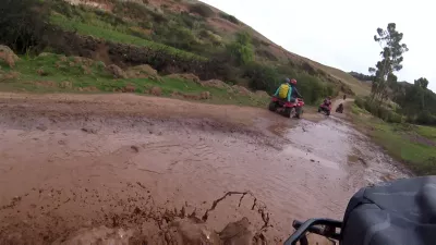 Should You Go For An ATV Tour Cusco Quading In 1 Day? Yes! : Driving through a pond