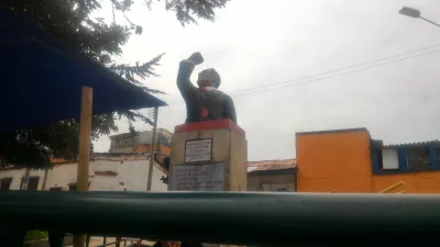 Breakfast at La Perseverancia district market : Gaitan statue