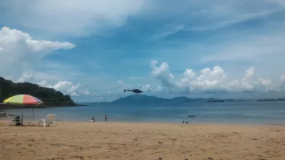 Hvordan er en strand-dagstur til øya Taboga, Panama? : Helikopter bringe gjester på Taboga-øya