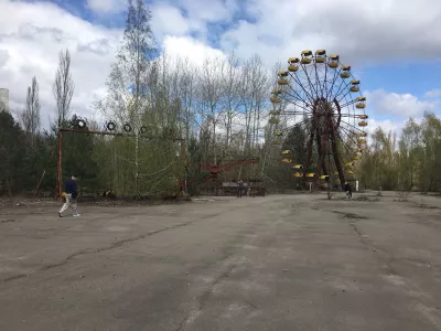 Pripyat day tour - visit of the abandoned city of Chernobyl nuclear disaster : Open air fair and abandonned ferris wheel