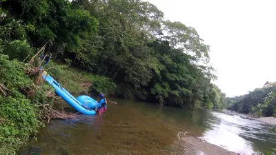White water rafting adventure on Mamoni river Panama : Sliding raft in the Mamoni river