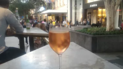 What are the best bars in Brisbane? : Glass of wine in Jimmy's On The Mall with view on Queen shopping street