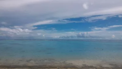 Quais são as melhores praias do Tahiti? : Água azul clara transparente em PK18 praia de areia branca