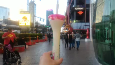 Walking on the best parts of Las Vegas strip up to the neon museum : Walking on The Strip with a Fat Tuesday street drink
