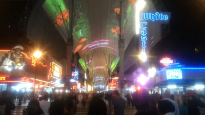 Walking on the best parts of Las Vegas strip up to the neon museum : Fremont street experience and its street zip line on the ceiling