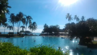 What are the best places to stay in Tahiti? : Private swimming pool lagoon like with white sand beach in Tahiti Ia Ora beach resort managed by Sofitel