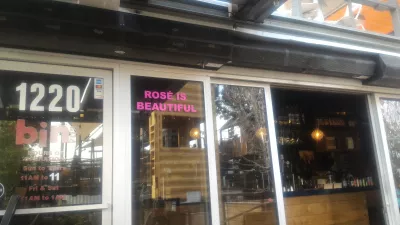 Brunch at container park Las Vegas and its praying mantis : Rosé is beautiful inscription on Bin702's door