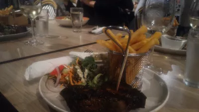 Where to find cheap food in Brisbane? A guide to the best places to eat in Brisbane : Steak fries and salad at The Plough Inn in SouthBank