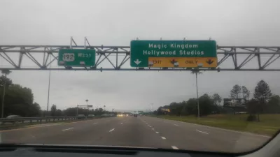 Going from New York City to Orlando, the world's Theme Parks capital : Road sign in direction of Walt Disney World