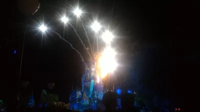 How is a one day visit at Disney's Magic Kingdom? : Fireworks display show at night on top of Cinderella's castle