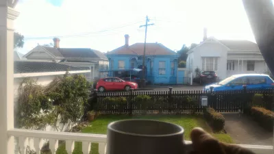 What are the best places to stay in Auckland New Zealand? : Morning coffee looking at the street