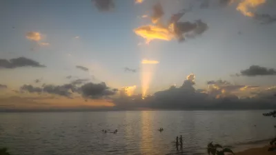 Beautiful sunset images on Tahiti best beach : Grey sunset in Tahiti over Moorea island free stock photos