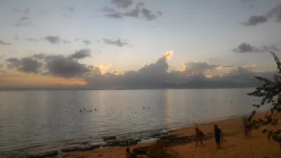 Beautiful sunset images on Tahiti best beach : Grey sunset in Tahiti over Moorea island free images download