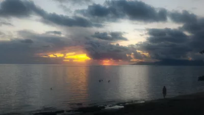 Beautiful sunset images on Tahiti best beach : Grey, yellow and orange sunset in Tahiti over Moorea island free stock photos