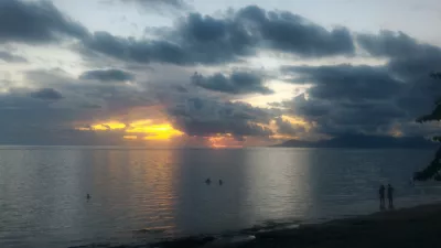 Beautiful sunset images on Tahiti best beach : Grey, yellow and orange sunset in Tahiti over Moorea island free stock photos