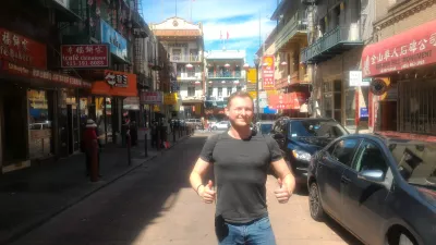 The best walking San Francisco city tour! : Taking a picture in a street in Chinese